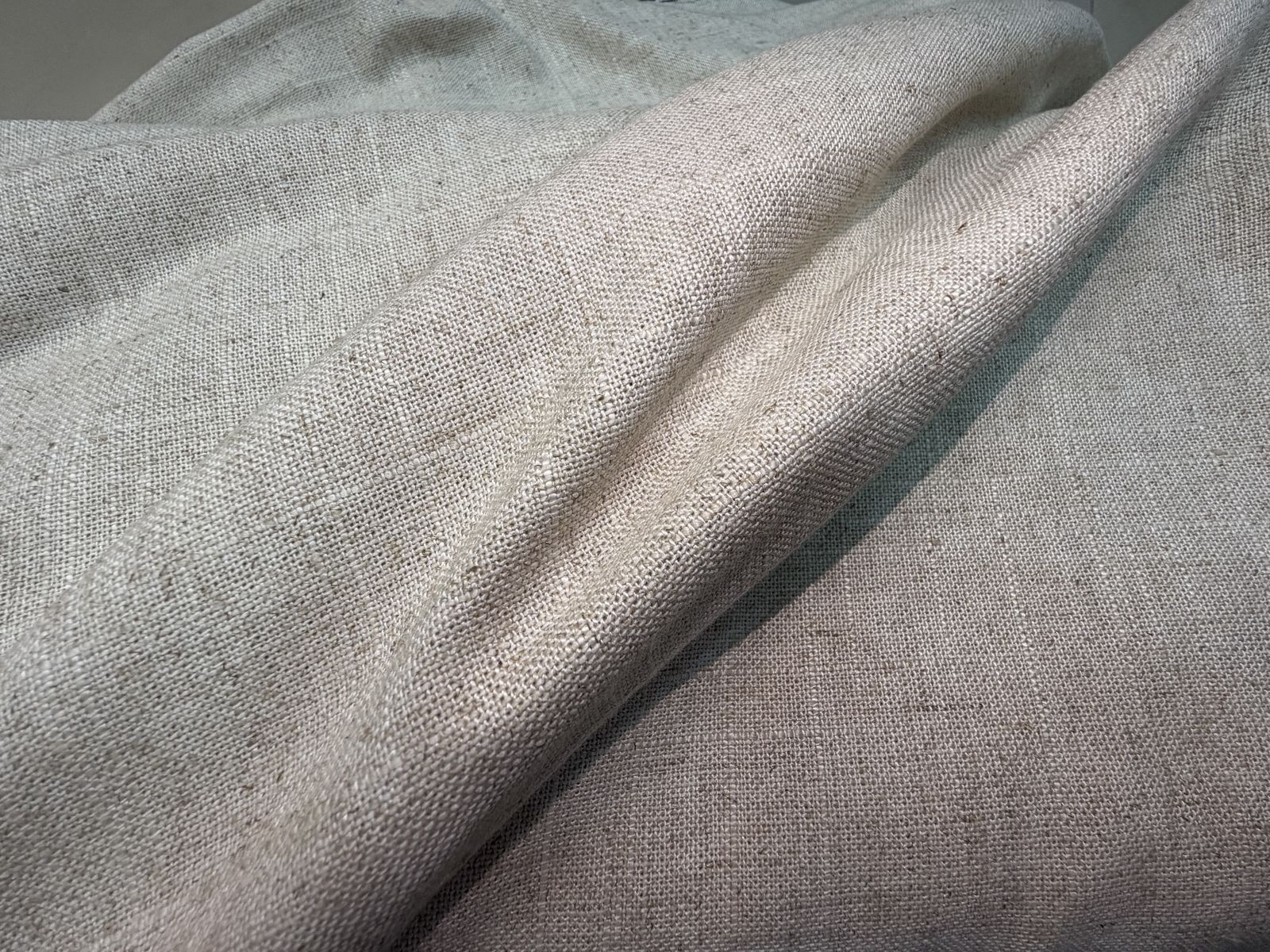 Soft folds of grey linen
